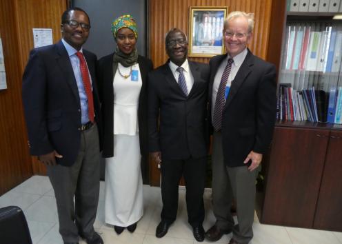 Photo of Ithar Hassaballa and Steve Fawcett along with two members of the WHO Regional Office in Brazzaville.